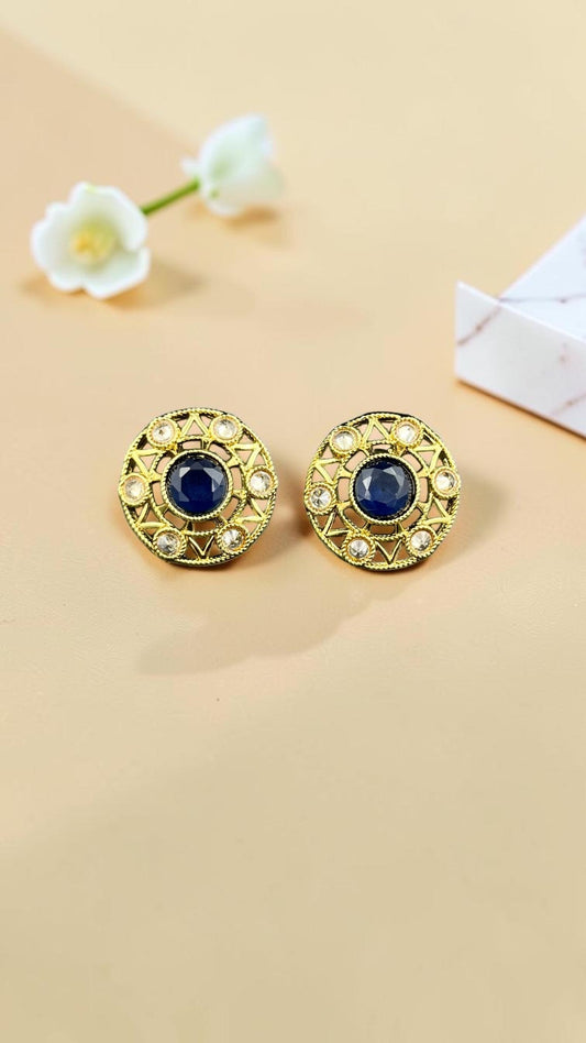SHE BEAUTY antique gold-tone stud earrings with a central dark blue stone and clear crystal accents