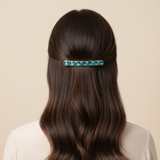SHE BEAUTY 7 gemstones barrette featuring vibrant blue rectangular crystals in a gold-tone setting on brown hair