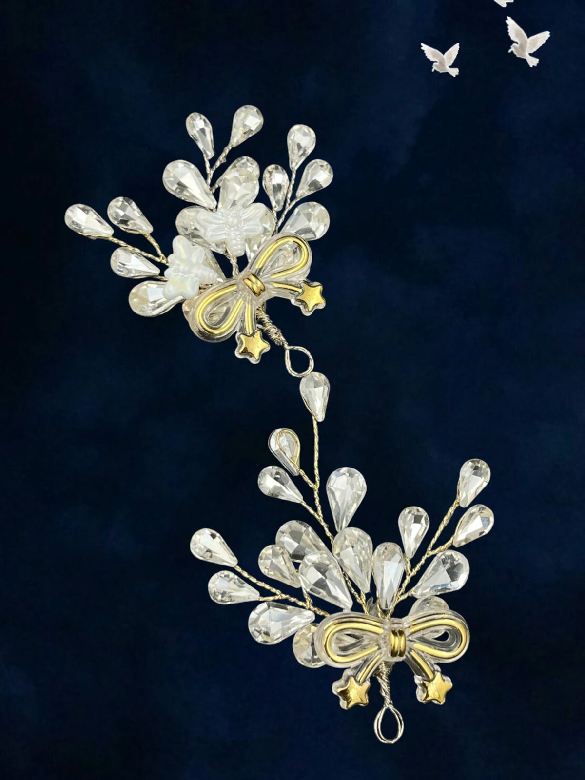 SHE BEAUTY coquette crystal hair clips featuring floral designs with gold bows and star accents on a dark background