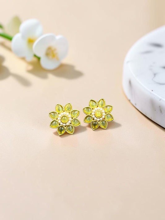 SHE BEAUTY floral stud earrings in gold with yellow teardrop stones and pearl accents for festive ethnic wear.