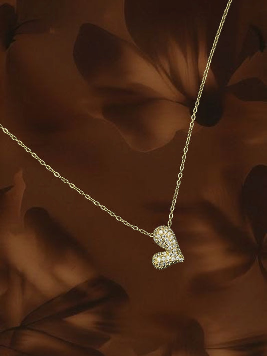 SHE BEAUTY Korean heart pendant necklace featuring a gold-tone chain and a sparkling crystal-encrusted heart charm.