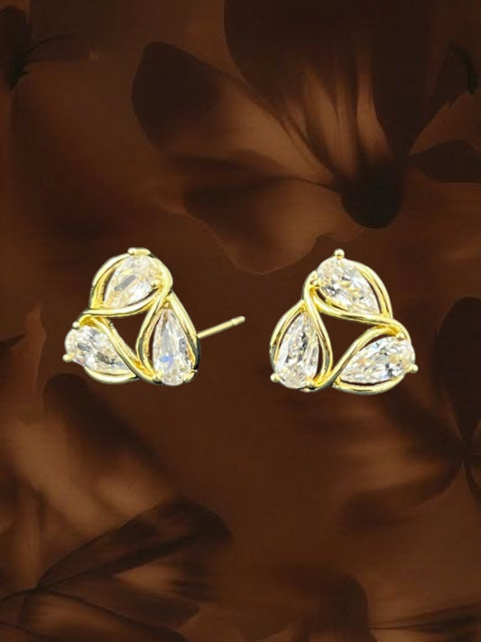 SHE BEAUTY AD petal pendant earrings featuring clear teardrop stones set in a gold-toned metal floral design