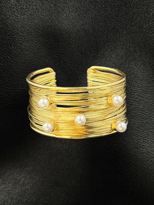 SHE BEAUTY golden multilayer cuff bracelet featuring five white pearls on a textured wire band for elegant party wear.