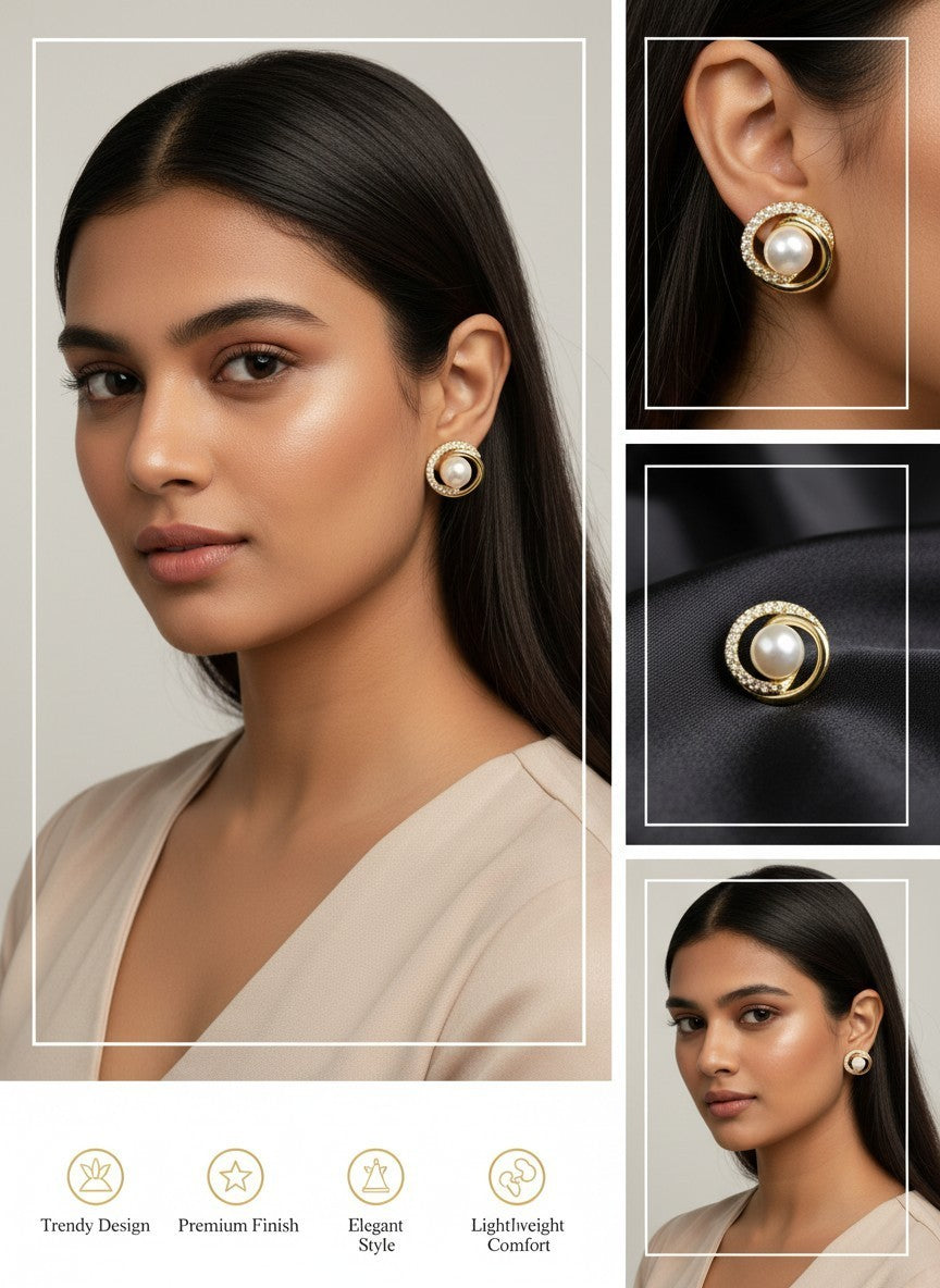 SHE BEAUTY IVORY PEARL stud earrings featuring a central white pearl surrounded by a gold-tone swirl and crystals.