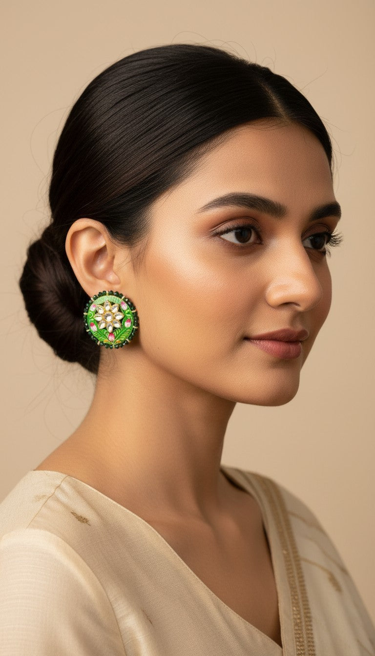 SHE BEAUTY Jaipuri Meena tops featuring green enamel, floral motifs, and white stones worn by a woman in a bun.