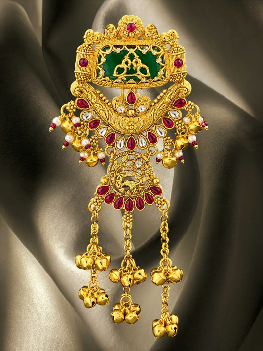 SHE BEAUTY Kashmiri royal gold hair brooch with green meena, red stones, and hanging ghungroo bells for festive wear.