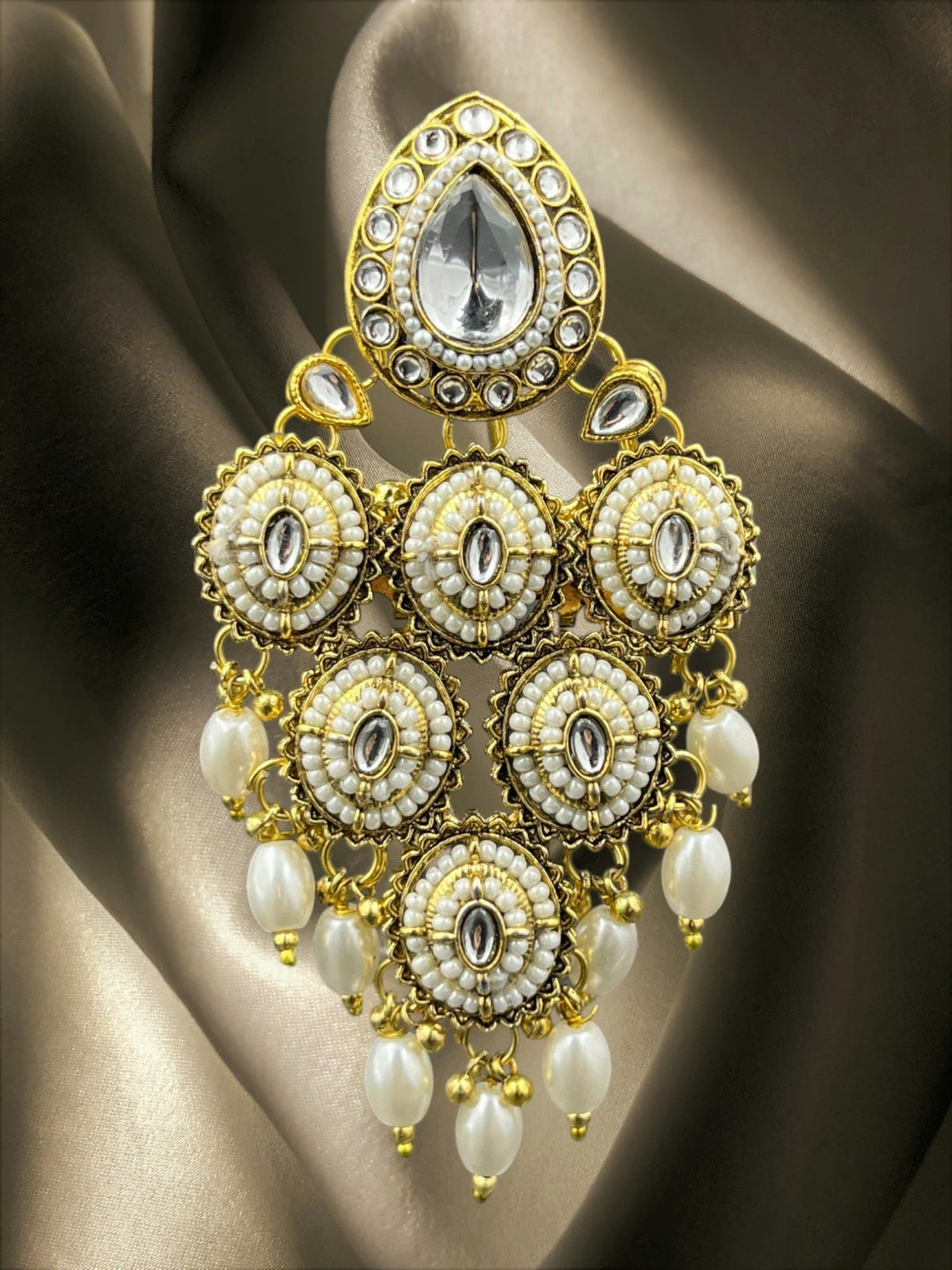 SHE BEAUTY Kundan Polki pearl juda hair brooch with gold-tone metal, intricate stone settings, and hanging pearl beads.