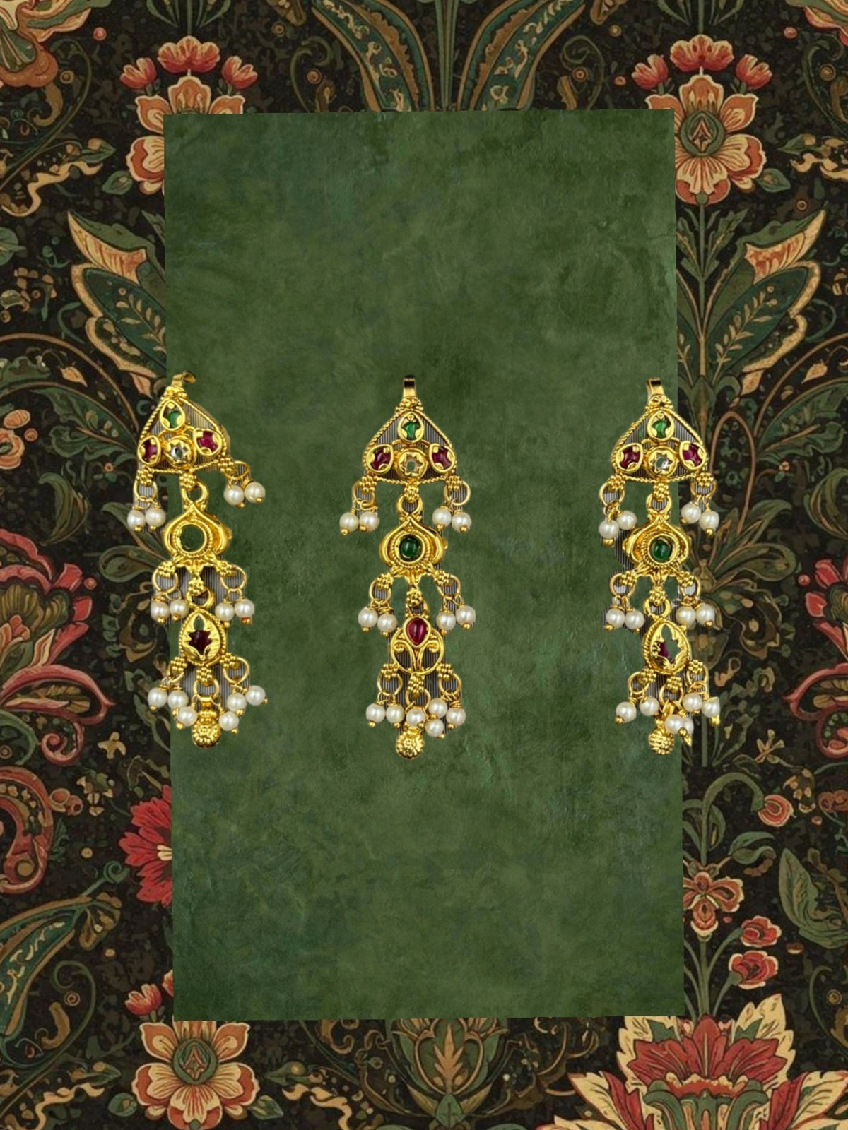 SHE BEAUTY set of three matt gold brooches featuring intricate traditional designs with red, green, and pearl accents.