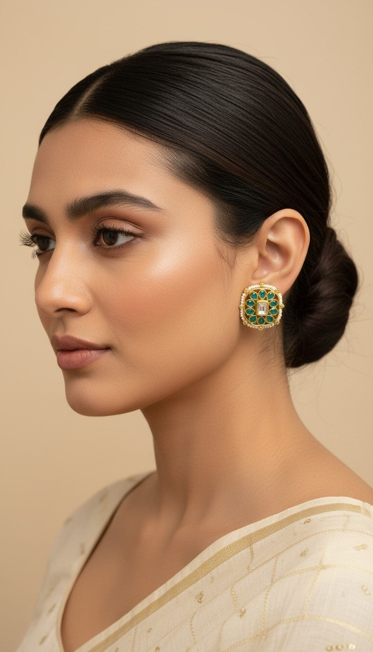 SHE BEAUTY square kundan tops featuring green stones and pearl detailing worn by a woman in a side profile view.