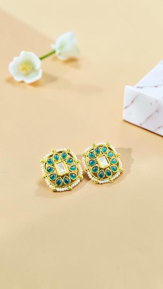 SHE BEAUTY square kundan tops featuring teal stones, a central white crystal, and delicate pearl border detailing.