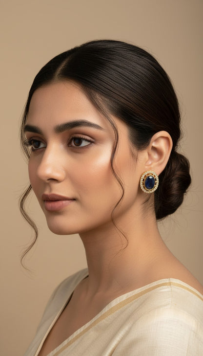 SHE BEAUTY AD antique tops featuring a central blue stone surrounded by white crystals in an elegant oval design.
