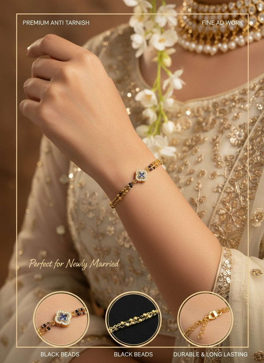 SHE BEAUTY anti-tarnish AD mangalsutra bracelet with black beads and a central stone-studded square charm on a wrist.