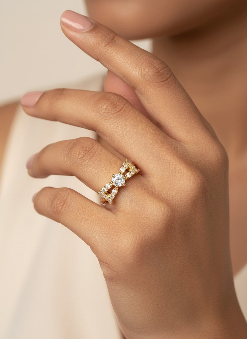 SHE BEAUTY anti-tarnish gold-plated ring featuring sparkling AD stones on a woman's finger for festive party wear.