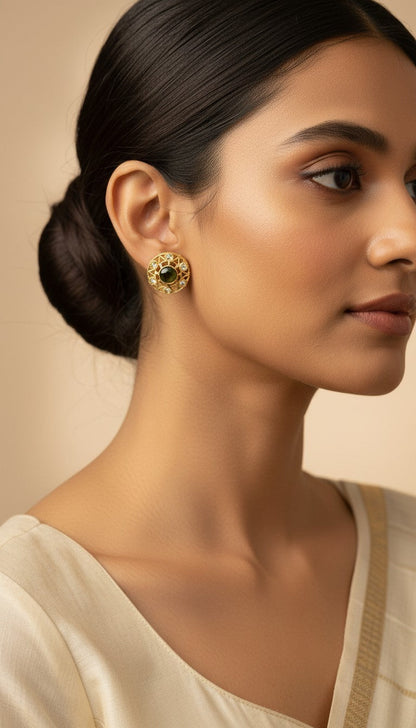 SHE BEAUTY antique colour tops featuring a round gold-toned filigree design with a central green stone and crystals.