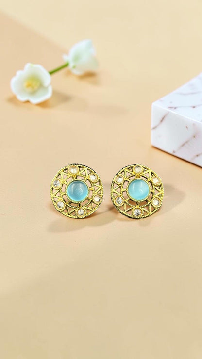 SHE BEAUTY antique gold-tone stud earrings featuring a central light blue stone surrounded by intricate filigree