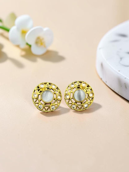 SHE BEAUTY antique gold-toned stud earrings with a central white stone and intricate geometric filigree detailing
