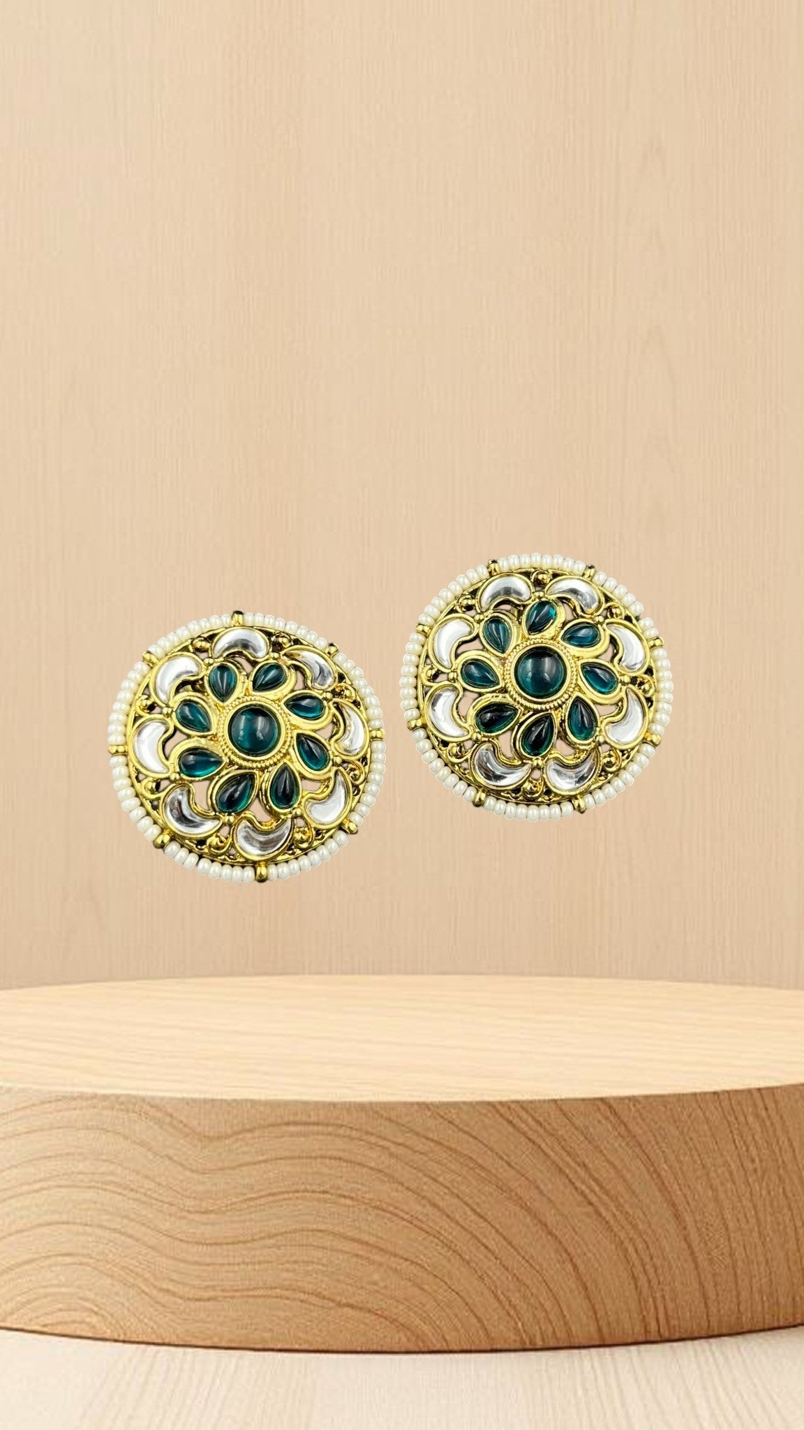 SHE BEAUTY antique kundan tops featuring green stones and white pearl accents in a circular gold-tone setting