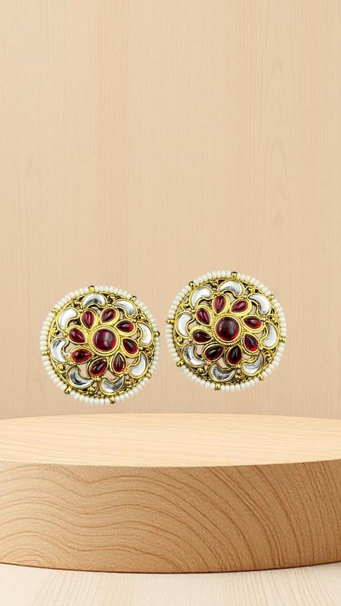 SHE BEAUTY antique kundan tops featuring round gold studs with red stones, white accents, and pearl bead borders.