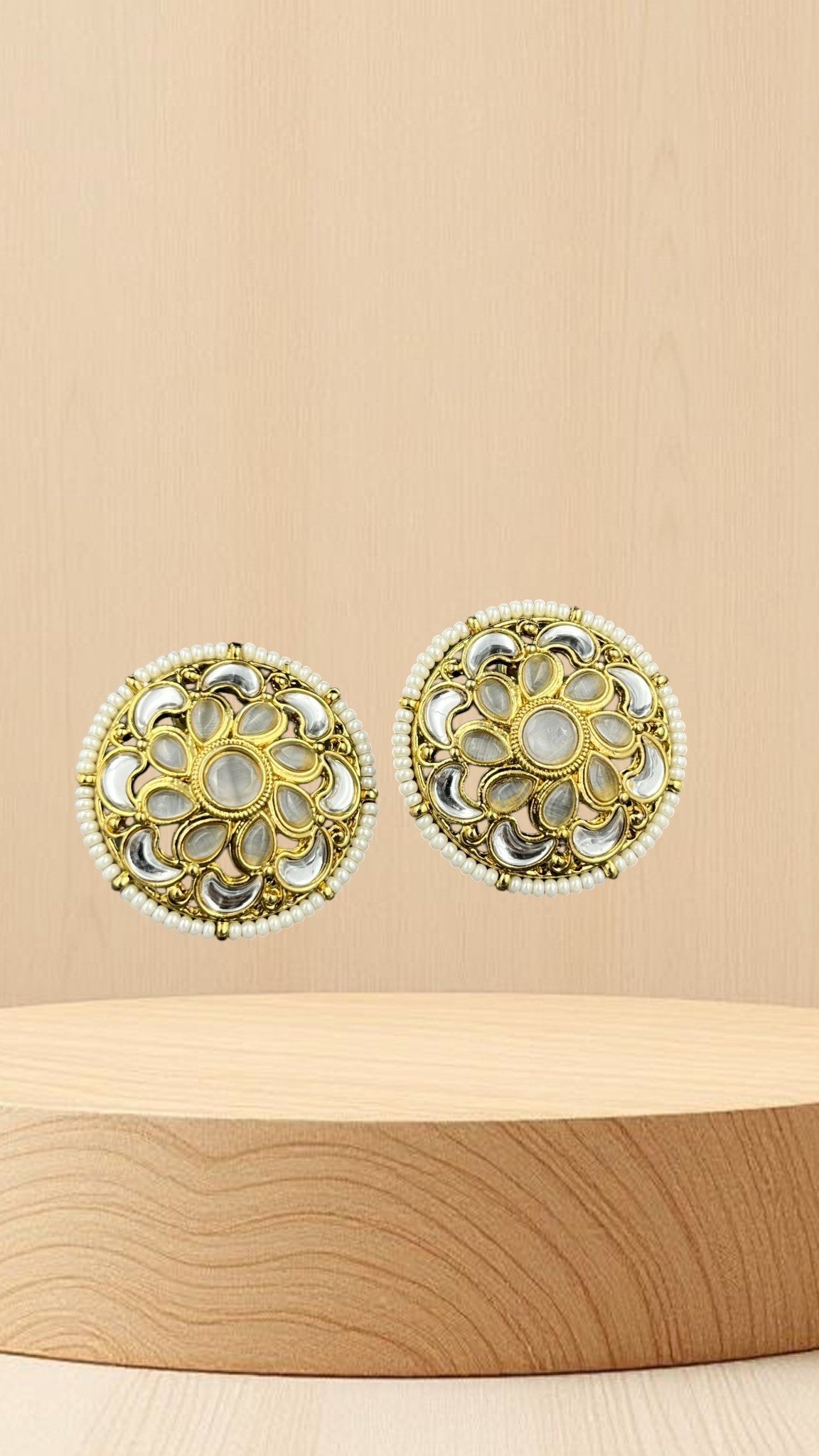 SHE BEAUTY antique kundan tops featuring circular gold-toned metalwork with white stone accents and pearl detailing.