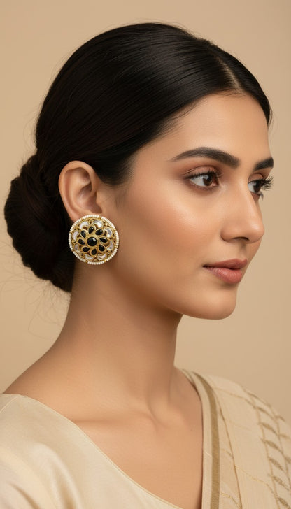 SHE BEAUTY antique kundan tops featuring a round gold floral design with black stones and pearl accents on a model