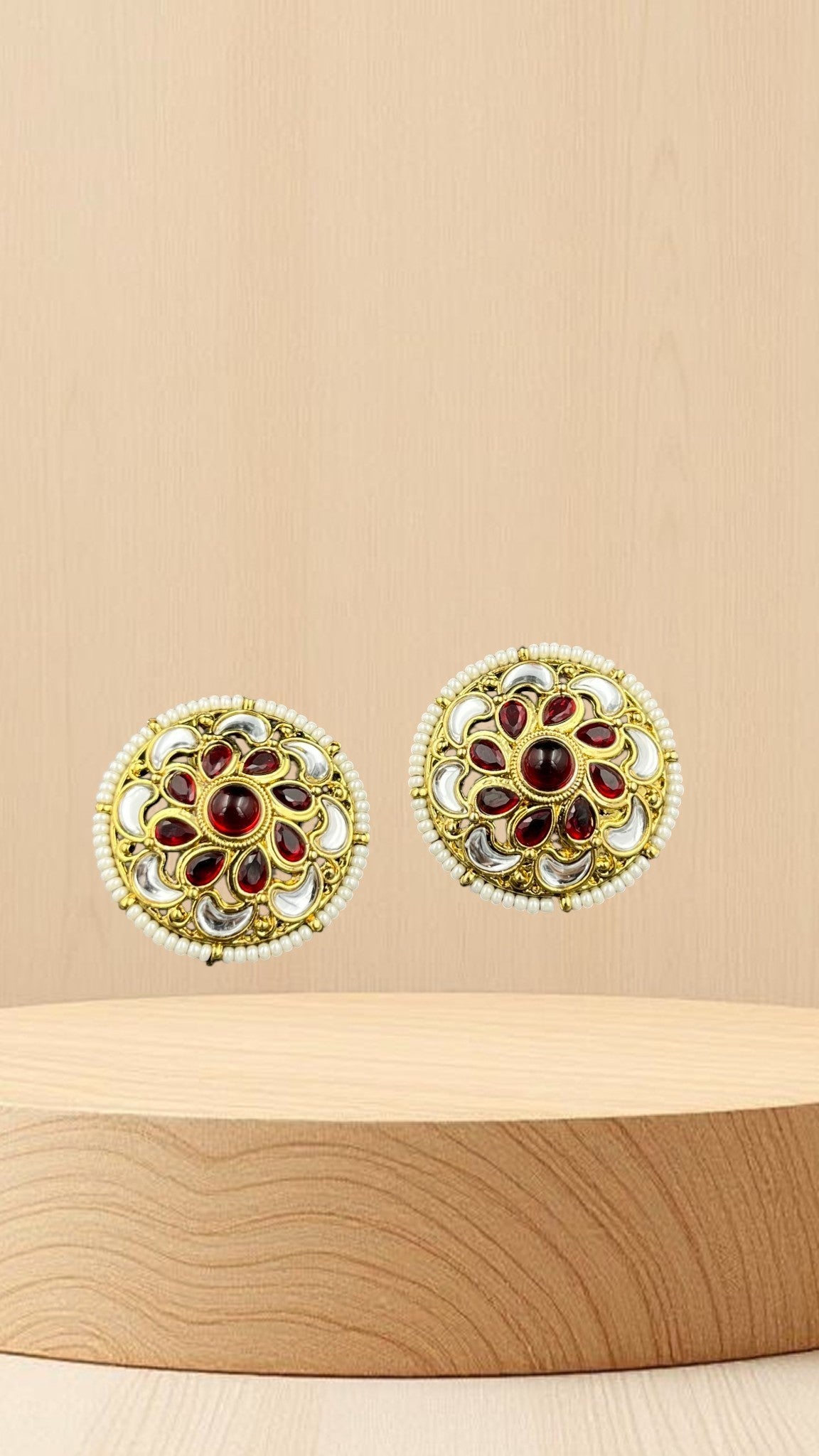 SHE BEAUTY antique kundan tops featuring red stones, white accents, and pearl borders in a traditional gold finish.