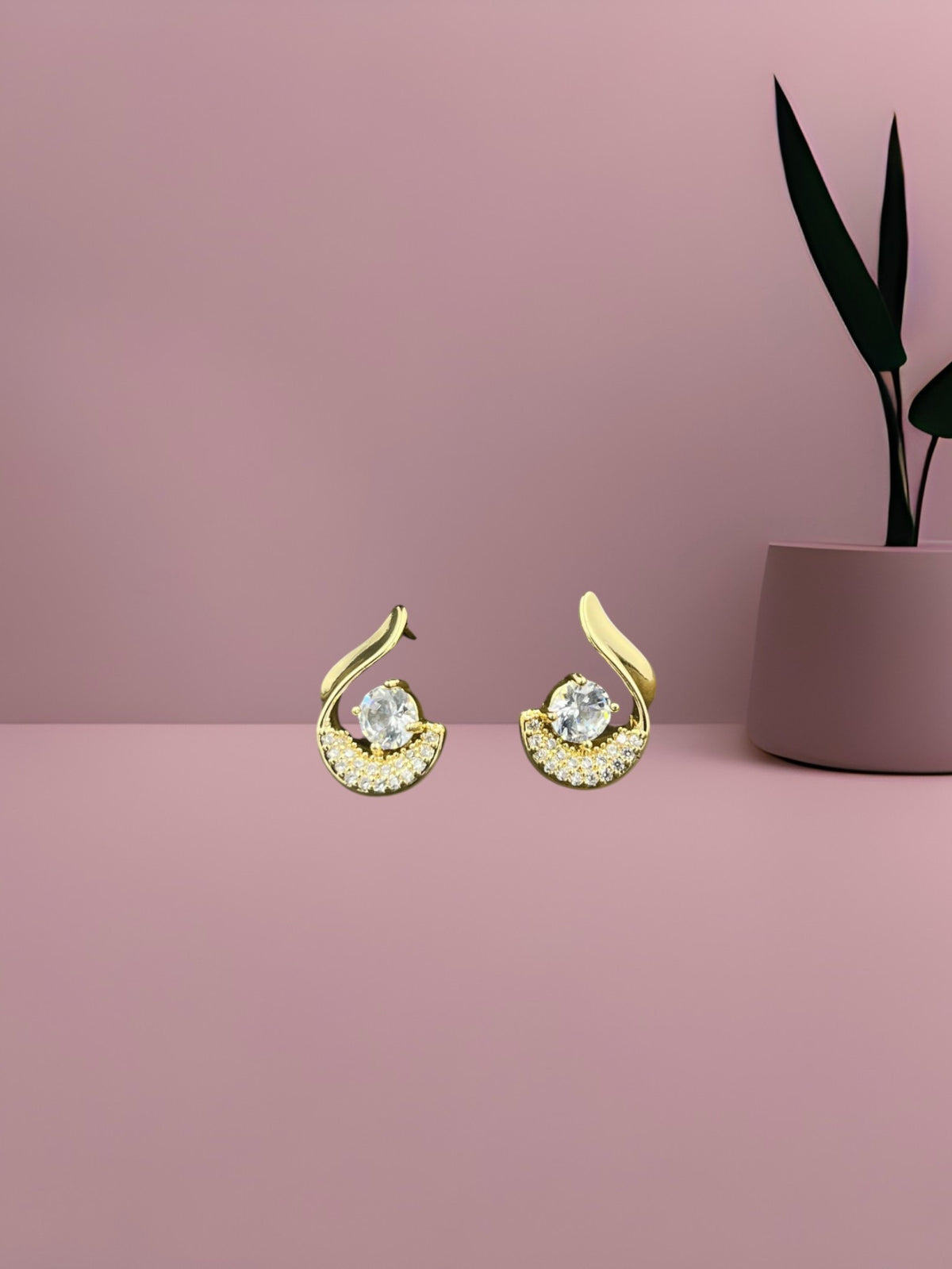 SHE BEAUTY AURA STUDS featuring gold-tone crescent shapes with central clear stones and pavé accents