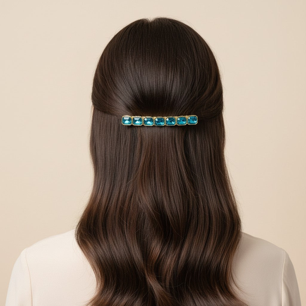 SHE BEAUTY 7 gemstones barrette featuring vibrant blue rectangular crystals in a gold-tone setting on brown hair