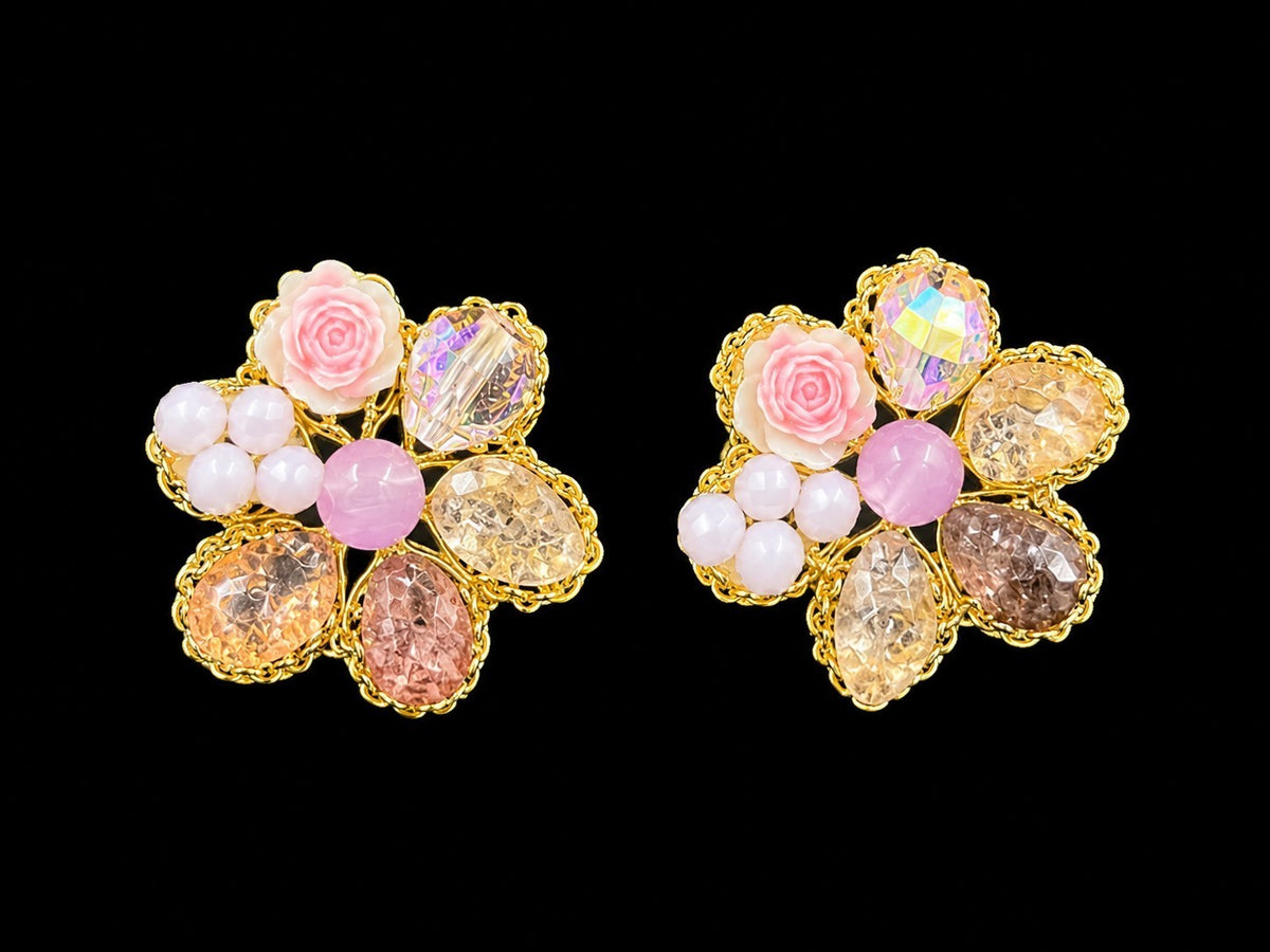 SHE BEAUTY BLUSH GARDEN floral stud earrings featuring pink rose accents, faceted crystals, and gold-tone settings.