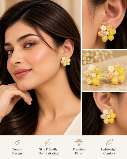 SHE BEAUTY Blush Garden floral stud earrings in yellow and blush pink, featuring delicate resin flower petals.