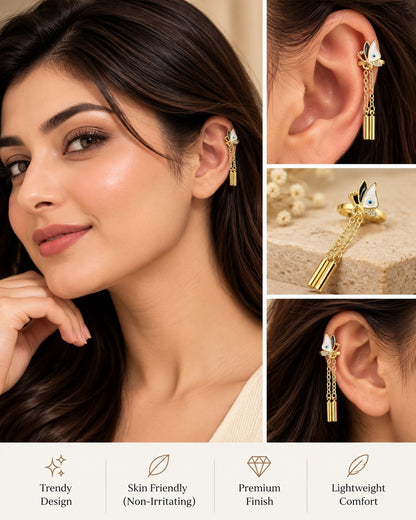 SHE BEAUTY BUTTERTRAILS CUFFS gold-tone ear cuff featuring a butterfly charm with dangling chain accents on a model.