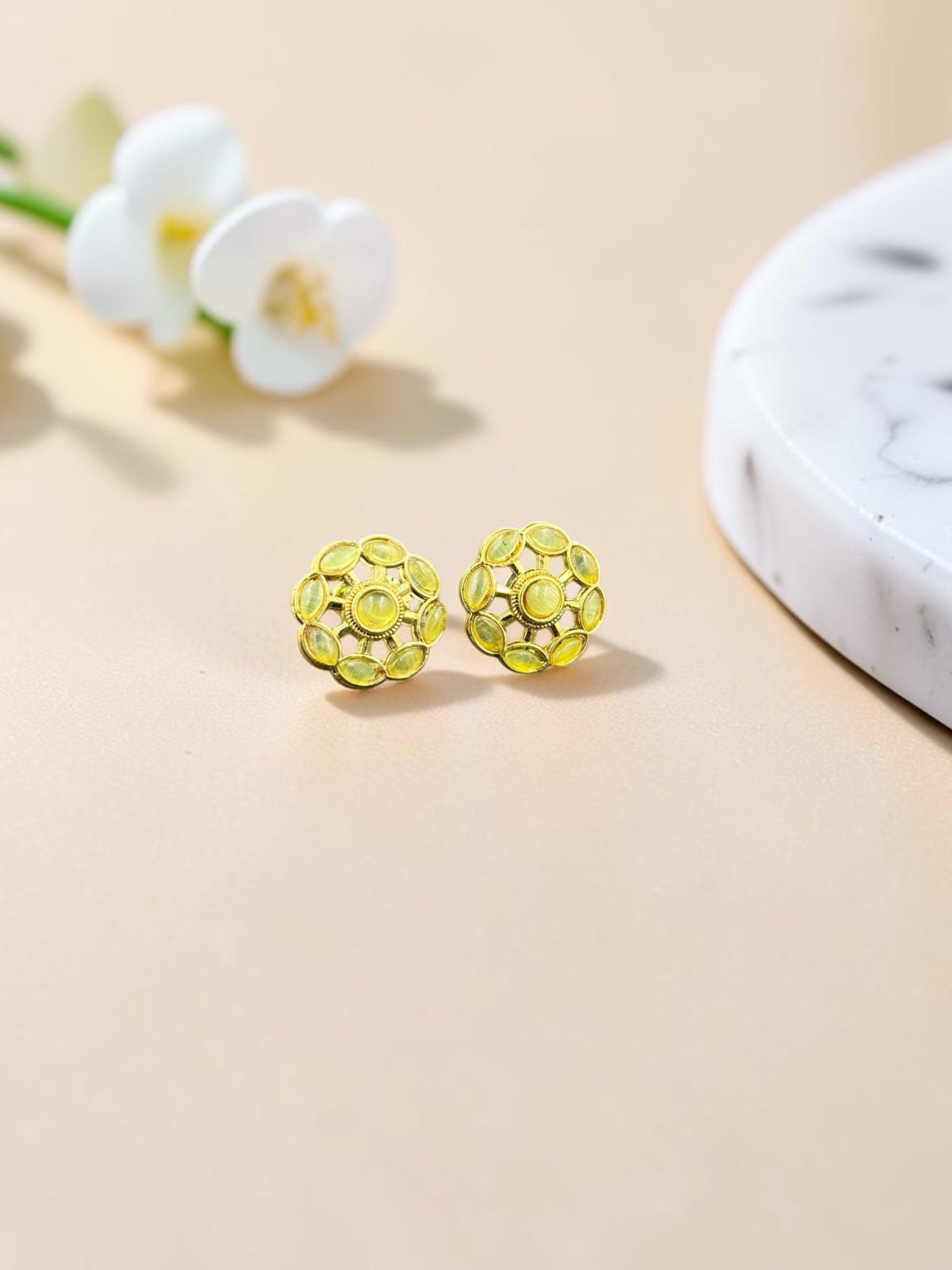 SHE BEAUTY COLOUR STUDS featuring round floral-inspired gold-tone earrings with central yellow stones for ethnic wear