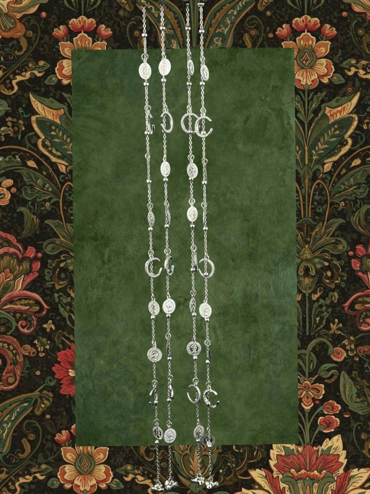 SHE BEAUTY 4-piece silver-toned chain set featuring crescent moon, coin, and bell charms for festive party wear.