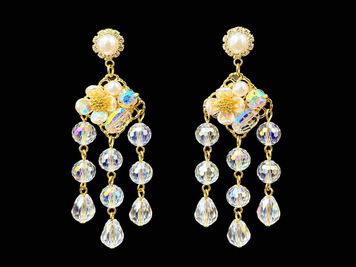 SHE BEAUTY CRYSTAL BOUQUET gold-tone drop earrings with iridescent crystal beads, faux pearls, and floral accents.