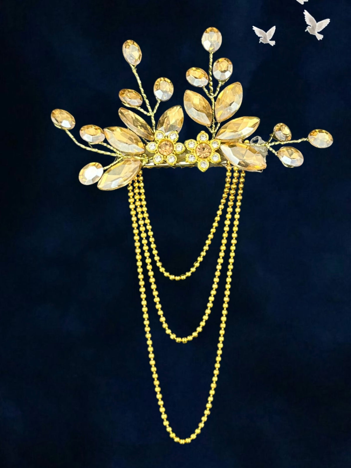 SHE BEAUTY crystal leaf hair pin with gold tone chain tassels and decorative rhinestone floral accents