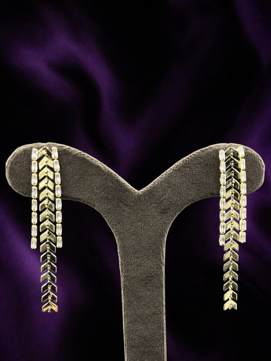 SHE BEAUTY Crystal Vines earrings featuring gold-tone chevron links and clear baguette crystals for festive wear.