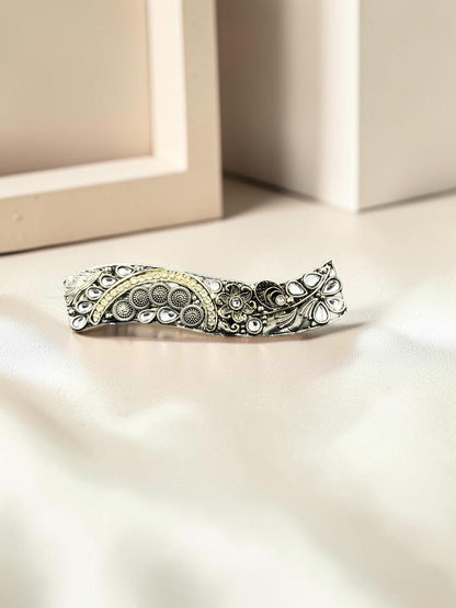 SHE BEAUTY curved vintage metallic barrette with intricate floral engravings and white stone accents for festive wear.