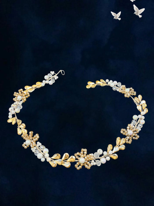 SHE BEAUTY floral crystal and pearl hair vine with gold leaf accents for festive and bridal hairstyles.