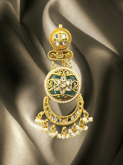 SHE BEAUTY Jaipuri floral hair brooch in gold with green enamel, kundan stones, and hanging pearl beads.