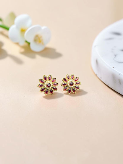 SHE BEAUTY floral stud earrings featuring maroon marquise stones and pearl accents in a gold-toned setting