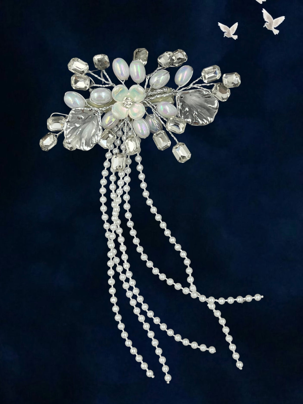 SHE BEAUTY fairy floral hair pin featuring iridescent petals, clear crystals, and delicate hanging pearl tassels.