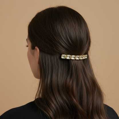 SHE BEAUTY 7 gemstones barrette featuring clear rectangular crystals on a gold-tone metal clip in brunette hair