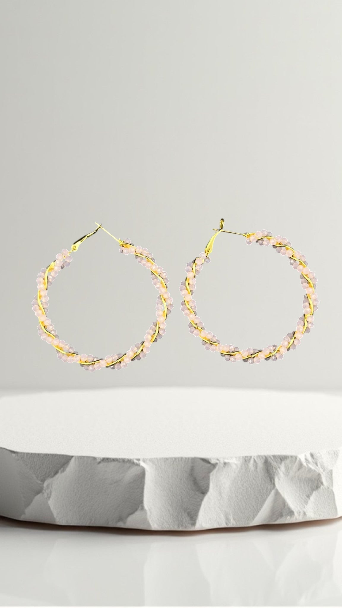 SHE BEAUTY GIRLISH CRYSTAL BALI hoop earrings featuring delicate pink crystal beads wrapped around gold wire hoops.