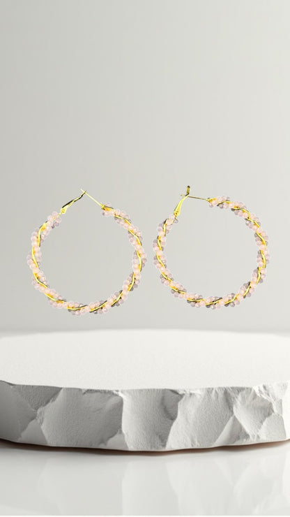SHE BEAUTY GIRLISH CRYSTAL BALI hoop earrings featuring delicate pink crystal beads wrapped around gold wire hoops.
