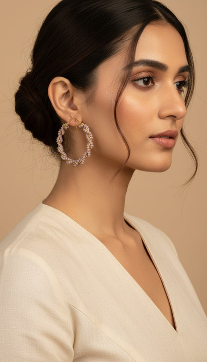 SHE BEAUTY GIRLISH CRYSTAL BALI hoop earrings featuring delicate light purple beads wrapped in gold wire on a model