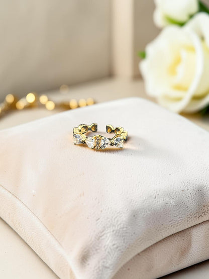 SHE BEAUTY anti-tarnish gold ring featuring sparkling AD stones in a delicate open-band design for festive wear.