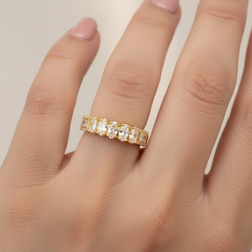 SHE BEAUTY anti-tarnish gold-plated ring featuring a row of sparkling marquise and square cut cubic zirconia stones