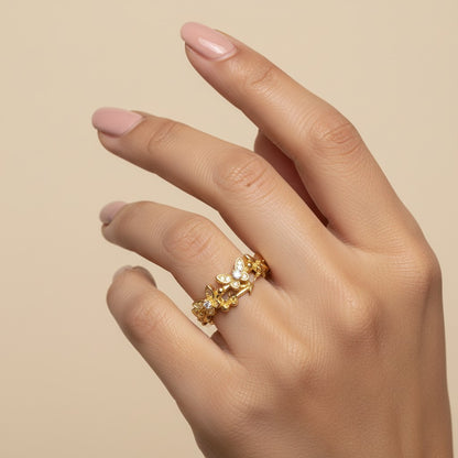 SHE BEAUTY gold-toned anti-tarnish ring featuring delicate butterfly motifs with sparkling AD stones on a hand