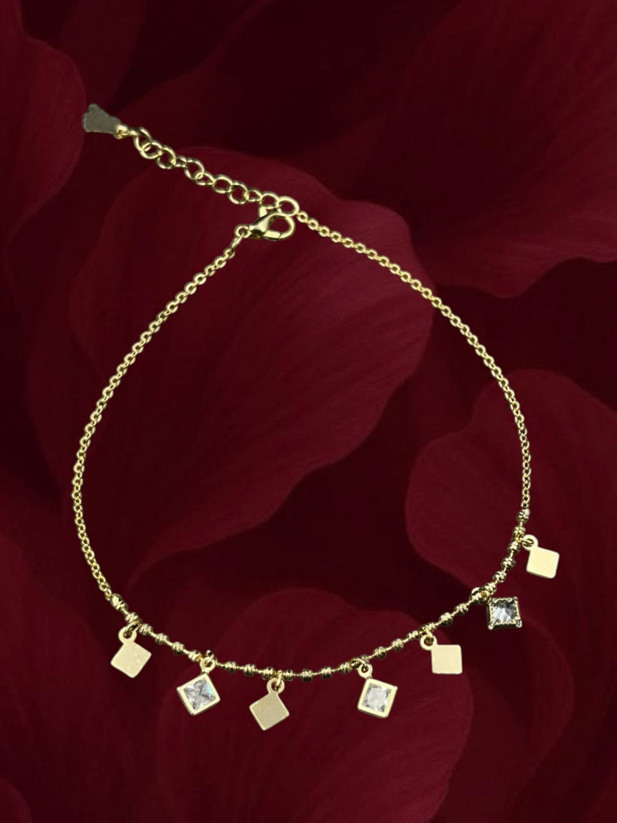 SHE BEAUTY gold-tone anti-tarnish anklet for girls featuring square charms and sparkling crystals on a delicate chain