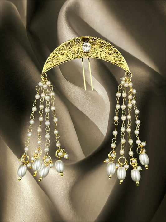 SHE BEAUTY gold-toned crescent moon hair brooch featuring intricate floral engravings and dangling pearl bead chains.