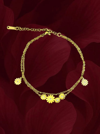 SHE BEAUTY KIYU ZIYU gold-toned double chain anklet featuring delicate daisy flower charms with crystal centers.